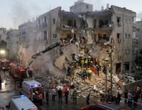 В Хайфе ракета попала в 7-этажный дом, среди раненых - младенец